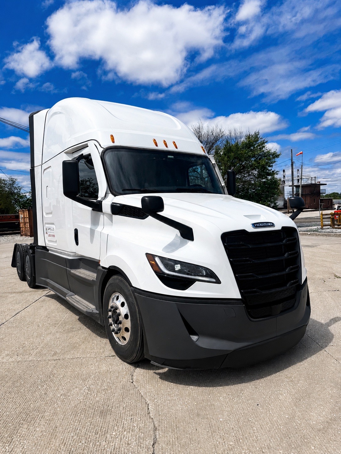 Apollo Freight Systems Freightliner Cascadia semi-truck parked at the Chicago-area terminal